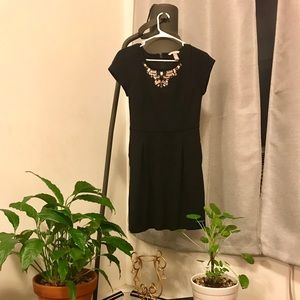 Little black dress with jeweled neckline